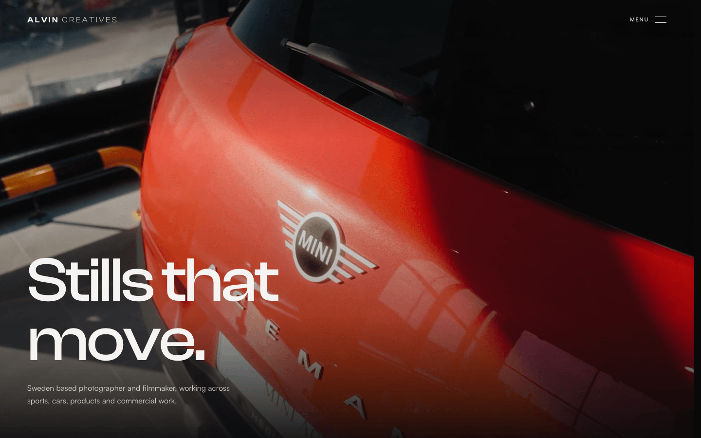 Photographer portfolio site with the headline "Stills that move." over a full-screen video